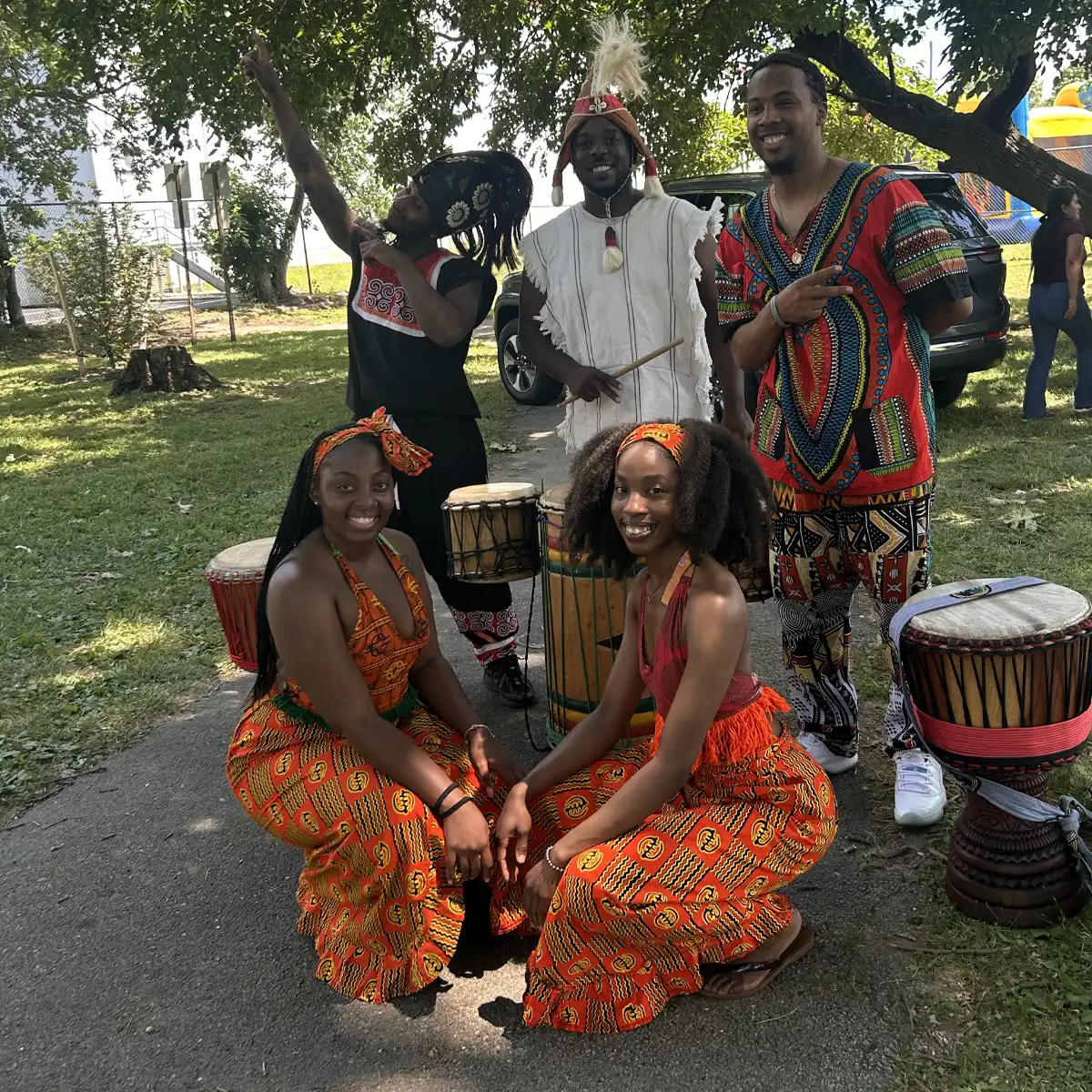 Dancers and performers pose